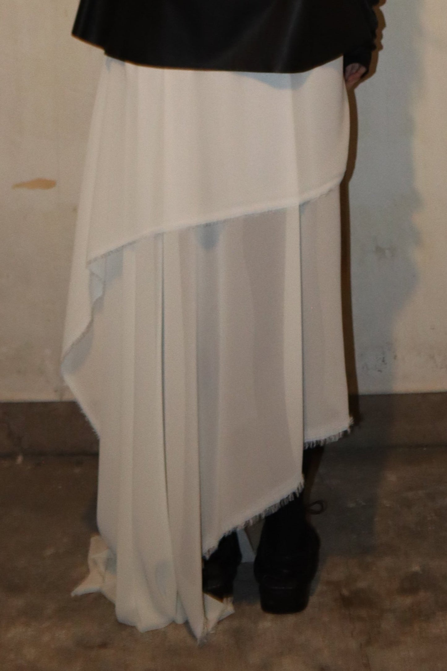Maison Isabel Maciel asymmetrical draped skirt, featured in lookbook.