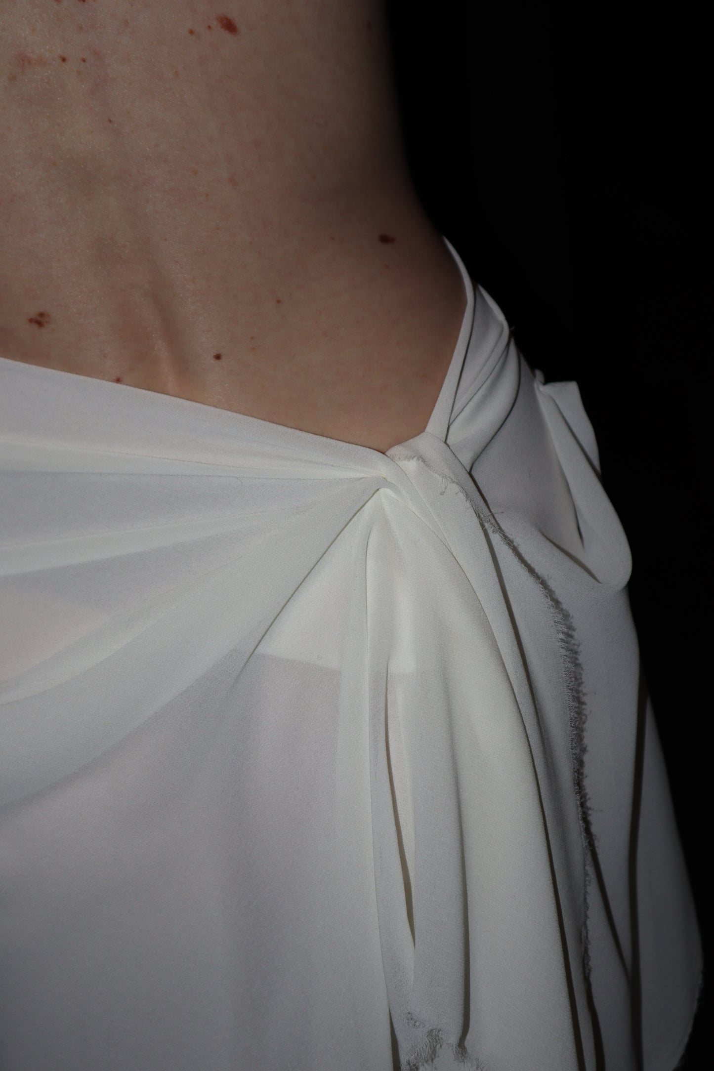 Maison Isabel Maciel asymmetrical draped skirt, featured in lookbook.