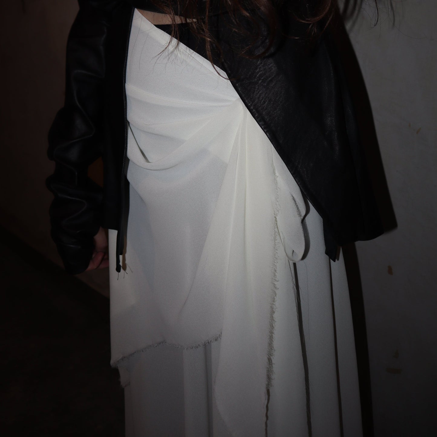Maison Isabel Maciel asymmetrical draped skirt, featured in lookbook.