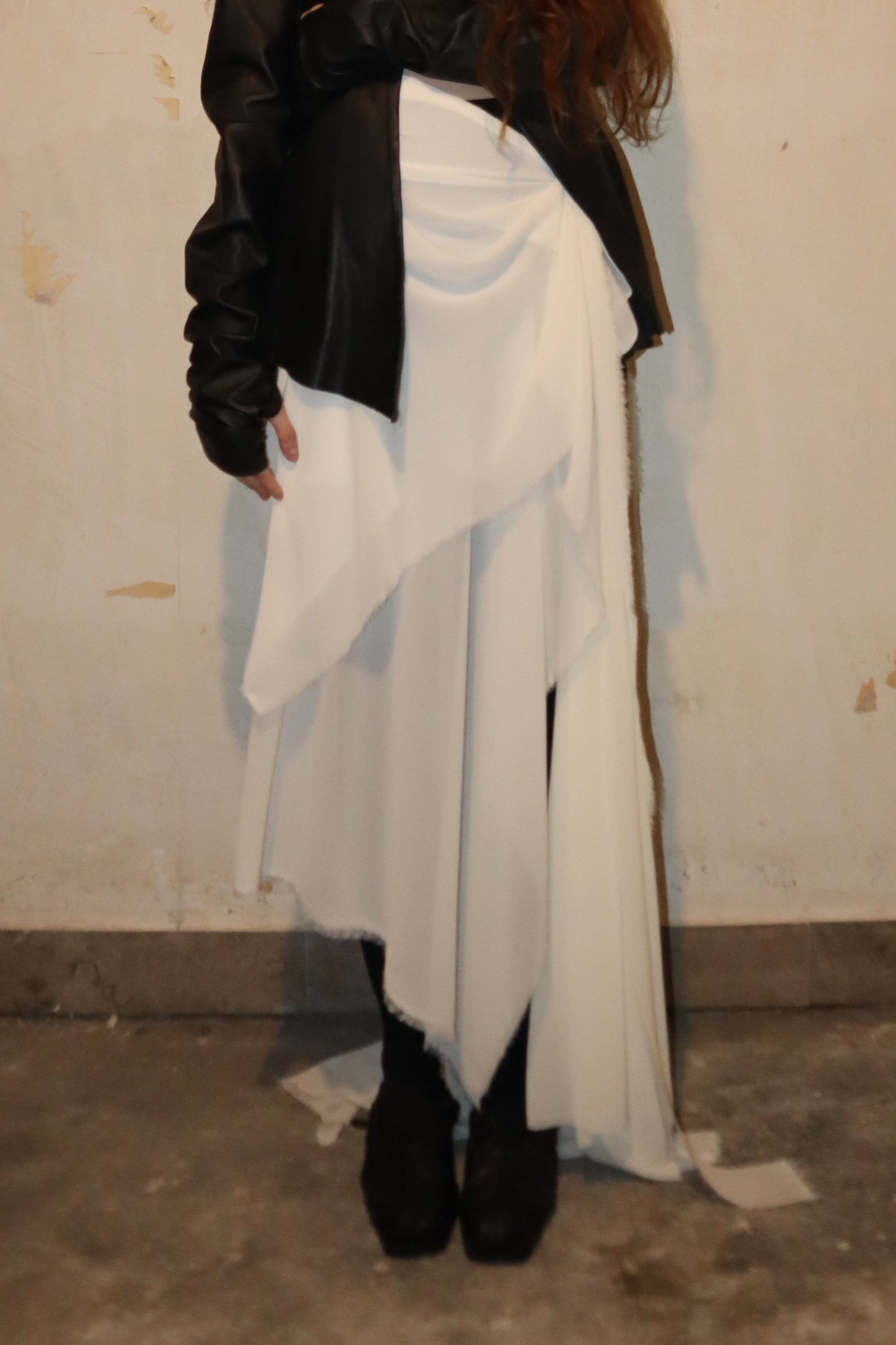 Maison Isabel Maciel asymmetrical draped skirt, featured in lookbook.