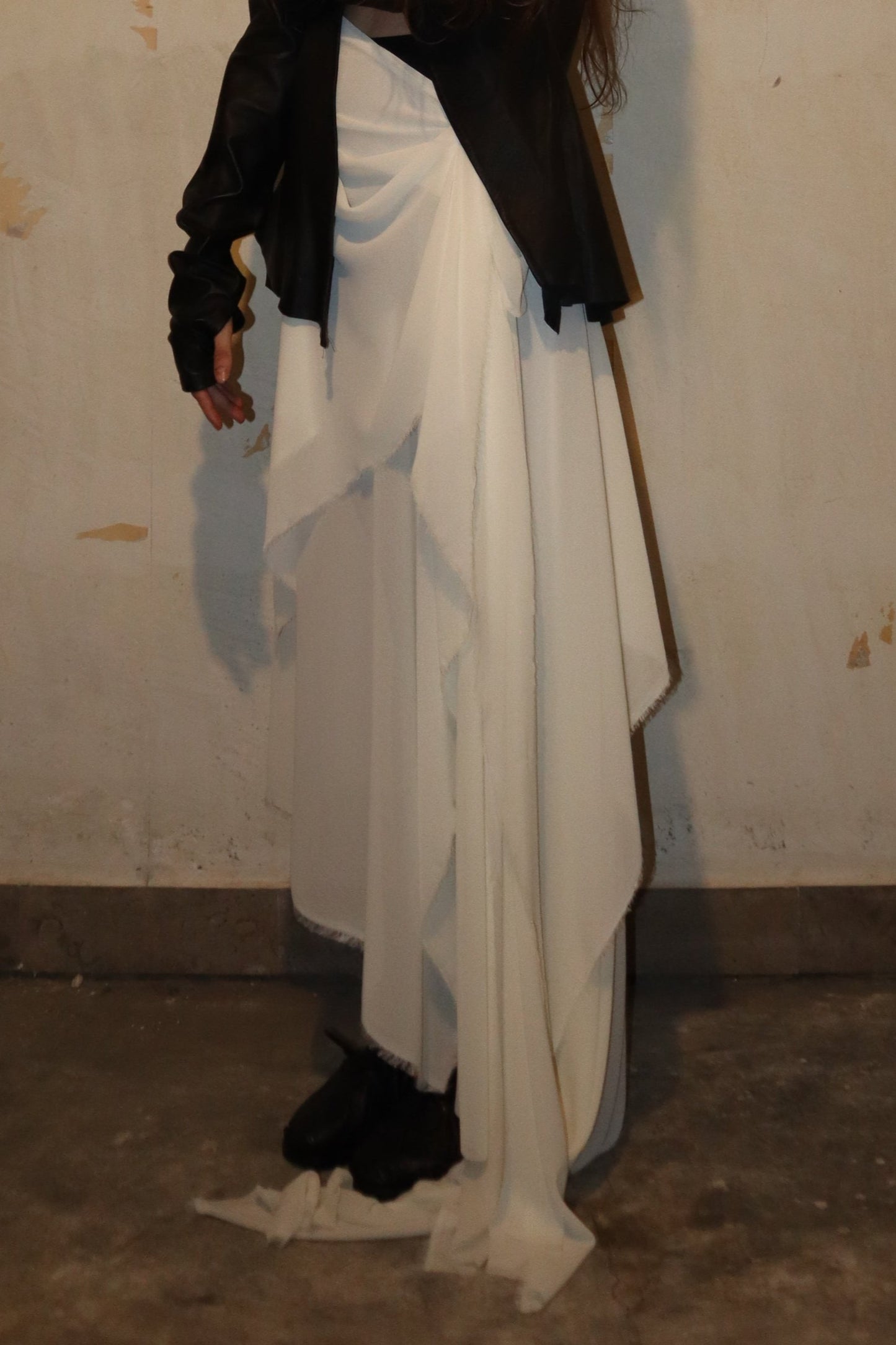 Maison Isabel Maciel asymmetrical draped skirt, featured in lookbook.