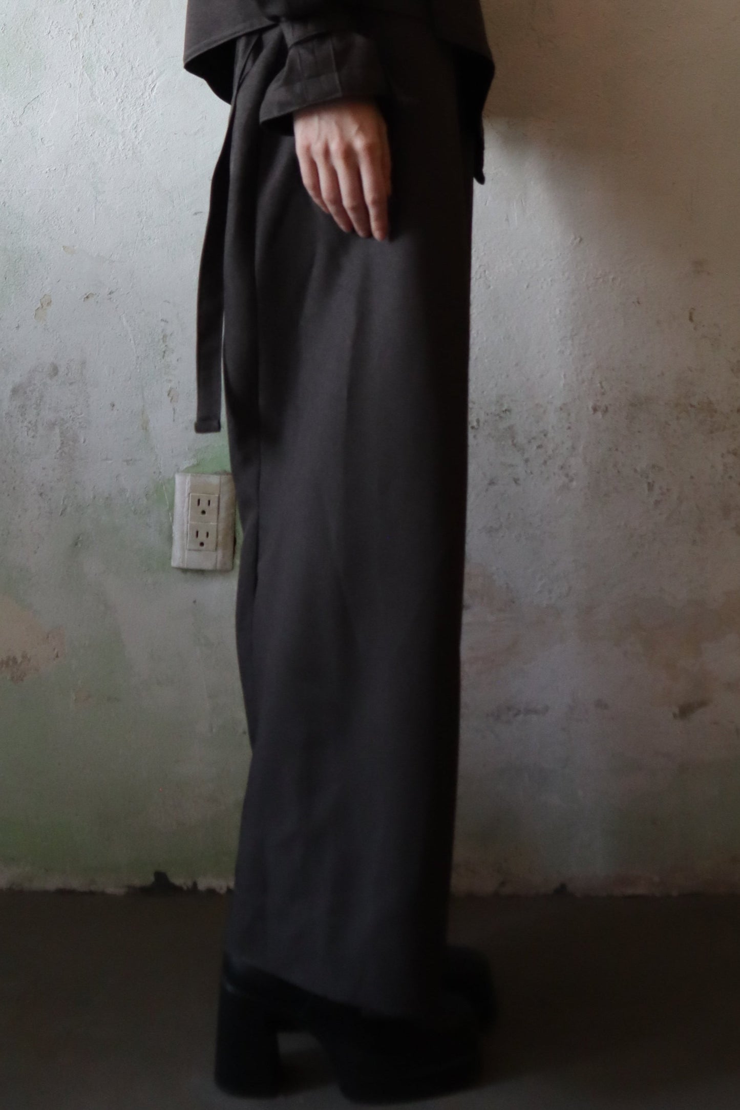 Maison Isabel Maciel asymmetrical wide leg pants with front pleats, featured in lookbook.