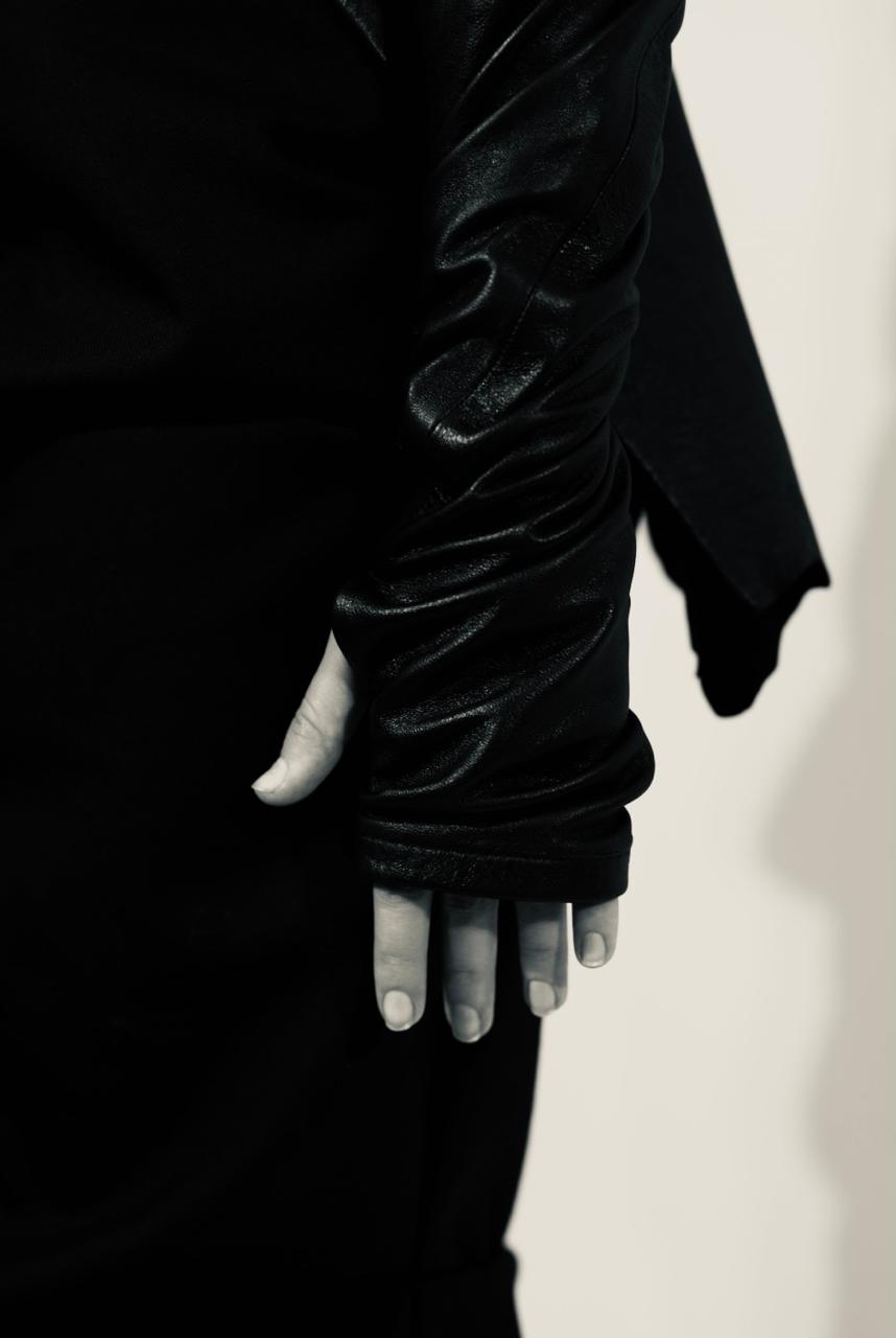 Maison Isabel Maciel - Asymmetric horse leather jacket with twisted sleeves, featured in lookbook.