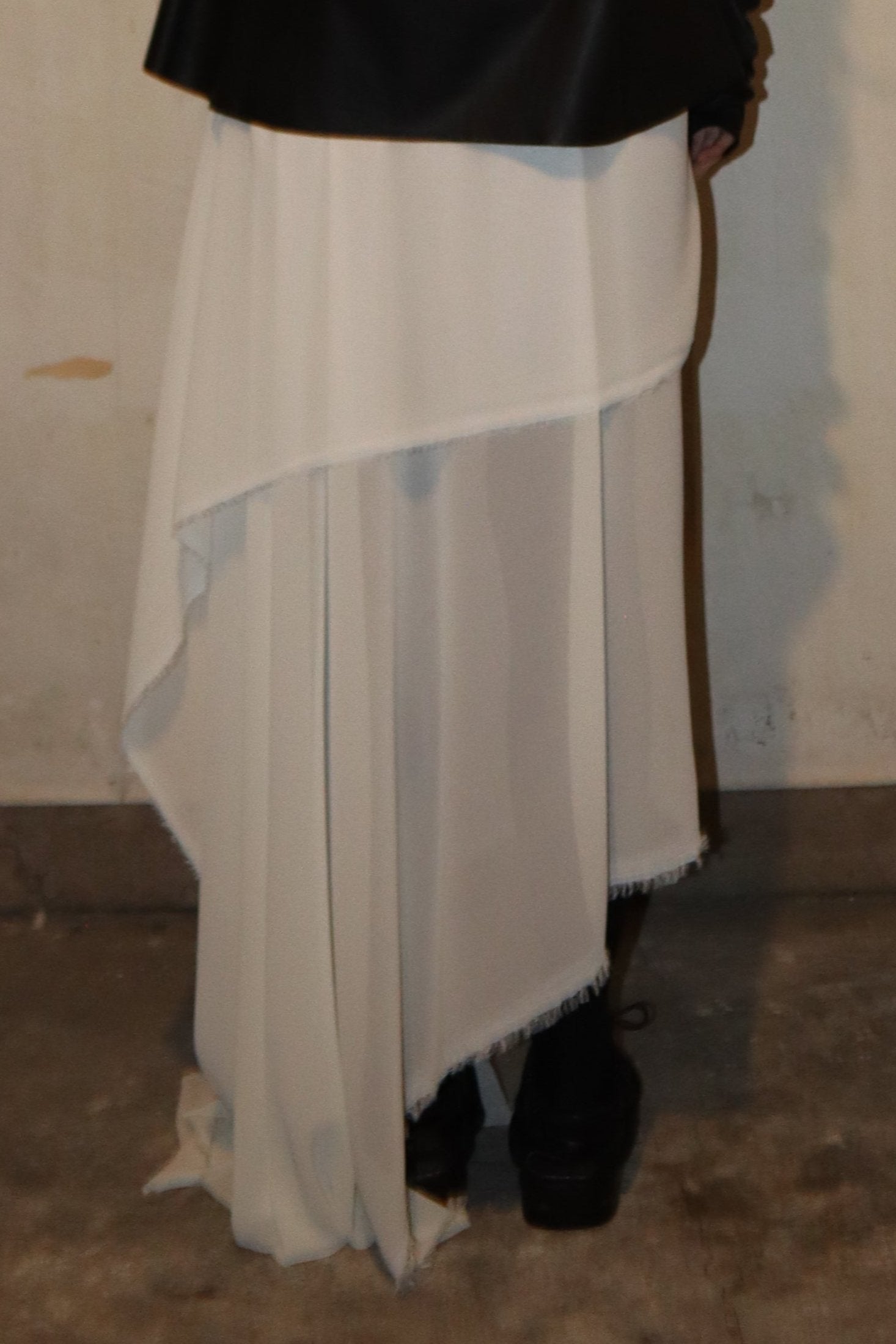 Maison Isabel Maciel asymmetrical draped skirt, featured in lookbook.