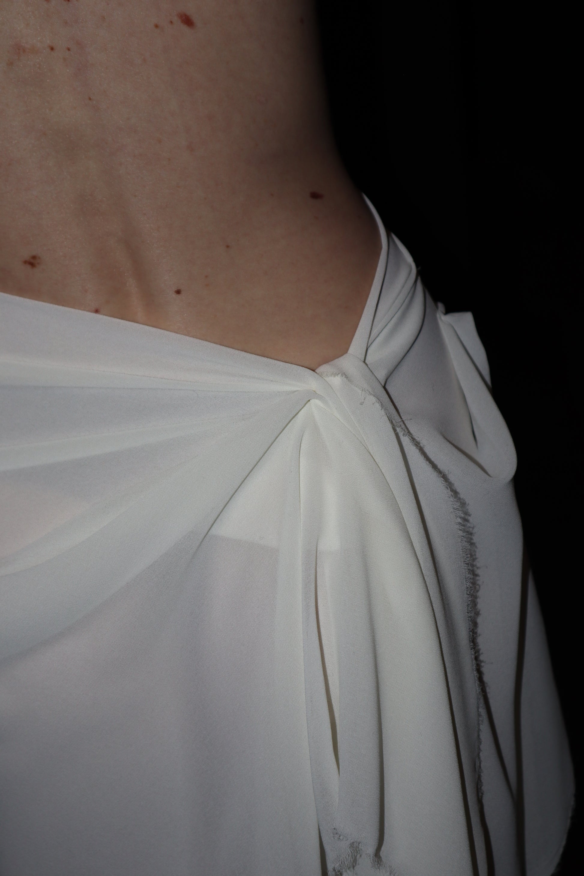 Maison Isabel Maciel asymmetrical draped skirt, featured in lookbook.