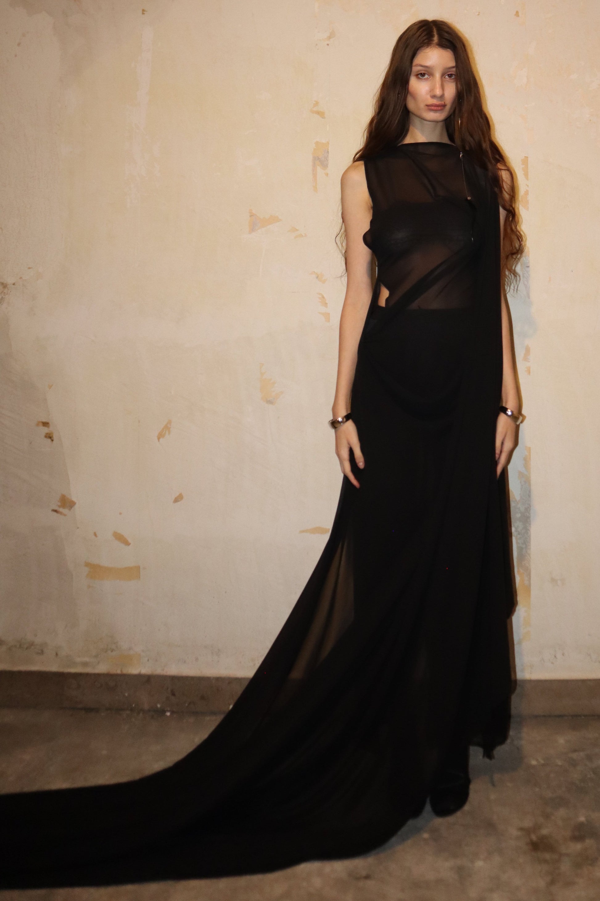 Maison Isabel Maciel hand-sewn asymmetric long dress with detailed stitching, featured in lookbook.