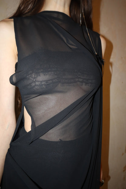 Maison Isabel Maciel hand-sewn asymmetric long dress with detailed stitching, featured in lookbook.