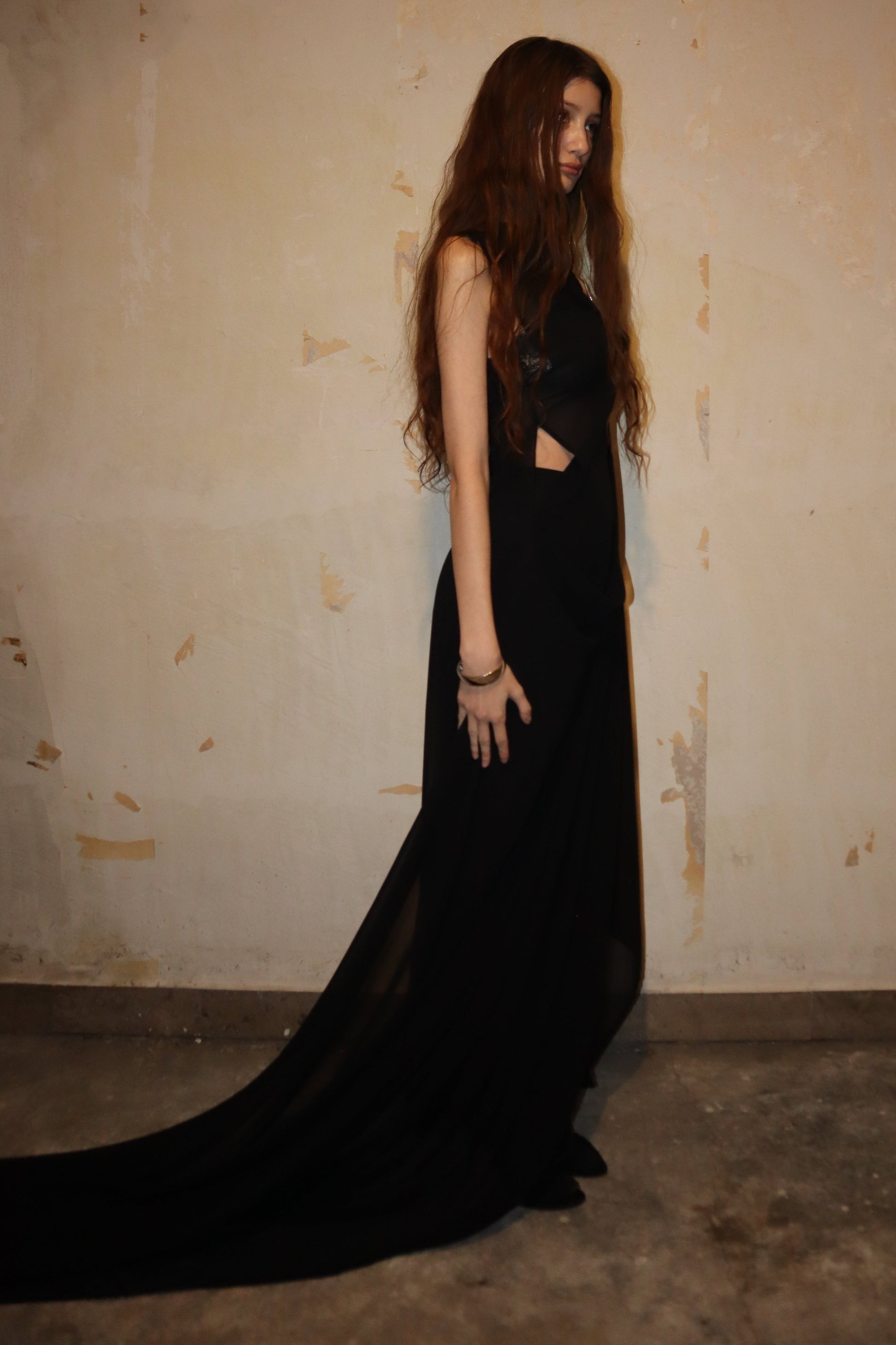 Maison Isabel Maciel hand-sewn asymmetric long dress with detailed stitching, featured in lookbook.